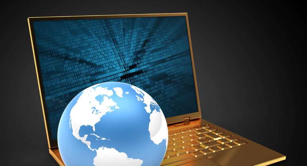3d illustration of golden computer over black background with binary data screen and earth globe